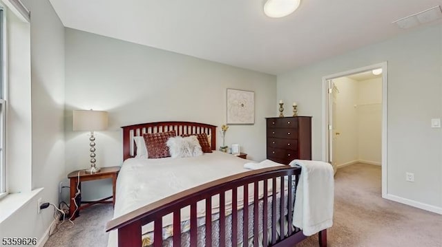 612 Magnolia Rd, North Brunswick Twp, NJ 08902 - bedroom with carpet flooring, a spacious closet, and baseboards