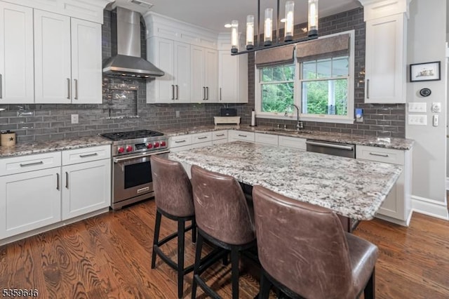 25 Wessex Ln, Montgomery Twp, NJ 08558 - kitchen with wall chimney exhaust hood, appliances with stainless steel finishes, a sink, and dark wood-style flooring