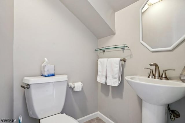 1794 Long Hill Rd, Long Hill Twp, NJ 07946 - bathroom featuring toilet, tile patterned floors, and lofted ceiling