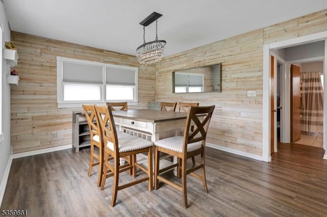 46 Sunrise Ter, Cedar Grove Twp, NJ 07009 - dining space with wooden walls, baseboards, a chandelier, and wood finished floors