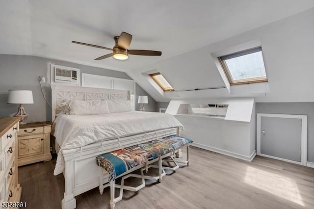 46 Sunrise Ter, Cedar Grove Twp, NJ 07009 - bedroom featuring a skylight, wood finished floors, lofted ceiling, ceiling fan, and baseboards