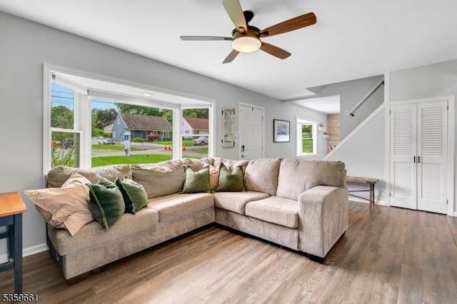 46 Sunrise Ter, Cedar Grove Twp, NJ 07009 - living room with healthy amount of natural light, ceiling fan, wood finished floors, and baseboards