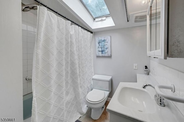 46 Sunrise Ter, Cedar Grove Twp, NJ 07009 - bathroom with toilet, a skylight, a shower with shower curtain, and vanity
