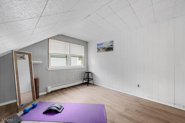 46 Sunrise Ter, Cedar Grove Twp, NJ 07009 - bonus room with baseboard heating, wood finished floors, and vaulted ceiling