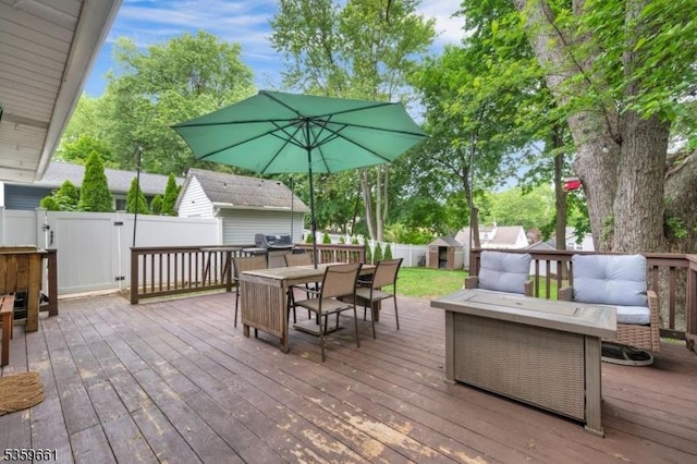 46 Sunrise Ter, Cedar Grove Twp, NJ 07009 - wooden terrace featuring outdoor dining area and a fenced backyard
