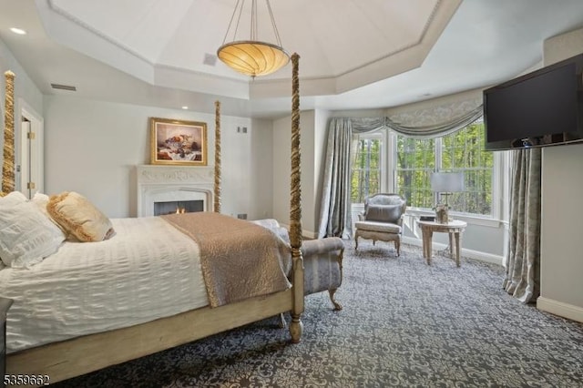 23 Stoningham Dr, Warren Twp, NJ 07059 - bedroom featuring carpet flooring, a raised ceiling, baseboards, a lit fireplace, and recessed lighting