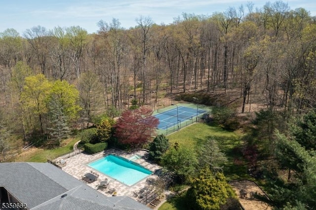 23 Stoningham Dr, Warren Twp, NJ 07059 - bird's eye view of a pool and a heavily wooded area