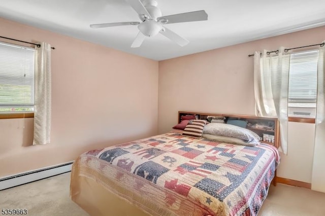 580 Eric Ln, Mount Arlington Boro, NJ 07850 - bedroom with a baseboard heating unit, carpet, and a ceiling fan
