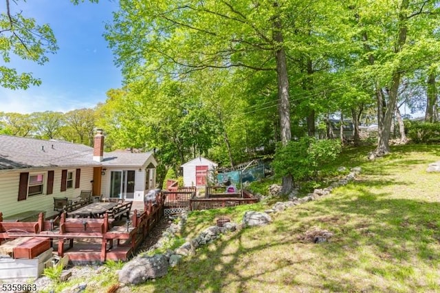 580 Eric Ln, Mount Arlington Boro, NJ 07850 - view of grassy yard featuring a wooden deck