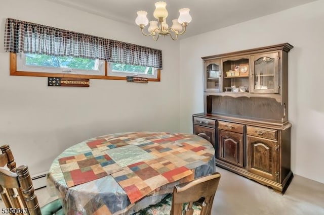 580 Eric Ln, Mount Arlington Boro, NJ 07850 - dining area featuring a chandelier and a baseboard radiator