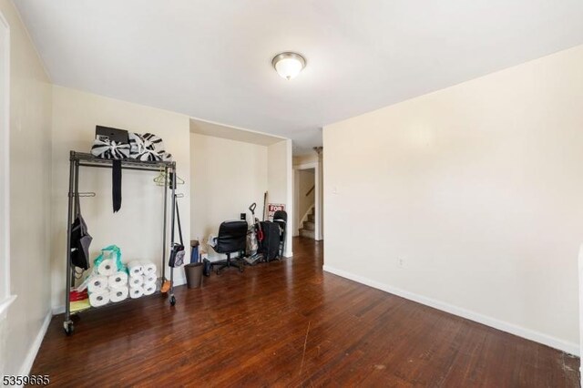 28 Beechwood Pl, Irvington Twp, NJ 07111 - workout room featuring wood finished floors and baseboards
