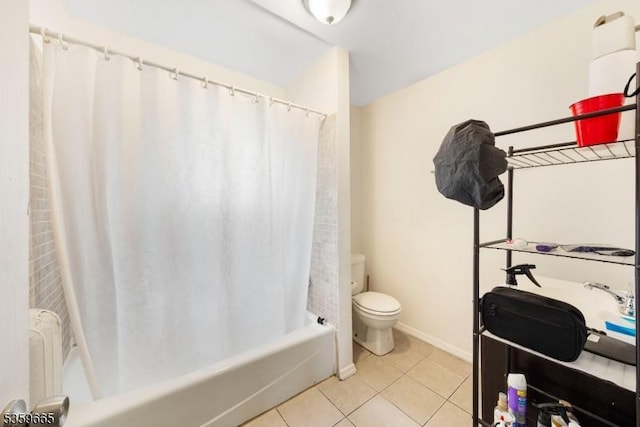 28 Beechwood Pl, Irvington Twp, NJ 07111 - bathroom with tile patterned floors, toilet, shower / tub combo, and baseboards