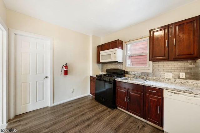28 Beechwood Pl, Irvington Twp, NJ 07111 - kitchen featuring white appliances, a sink, dark wood-style floors, backsplash, and baseboards