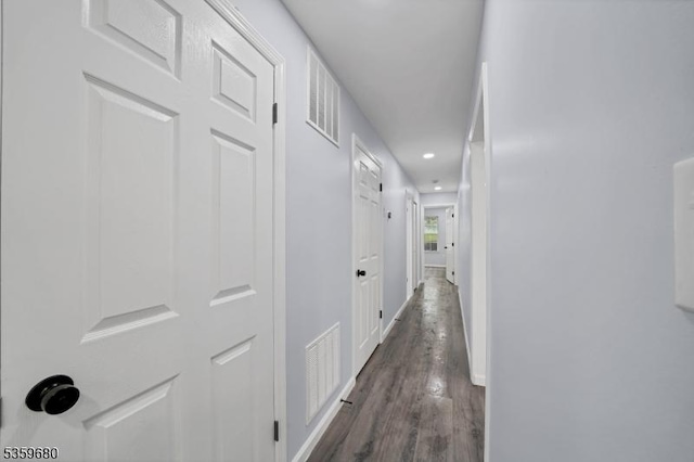 173 Gregory Ln, Franklin Twp, NJ 08823 - hall featuring dark wood-type flooring, baseboards, and recessed lighting