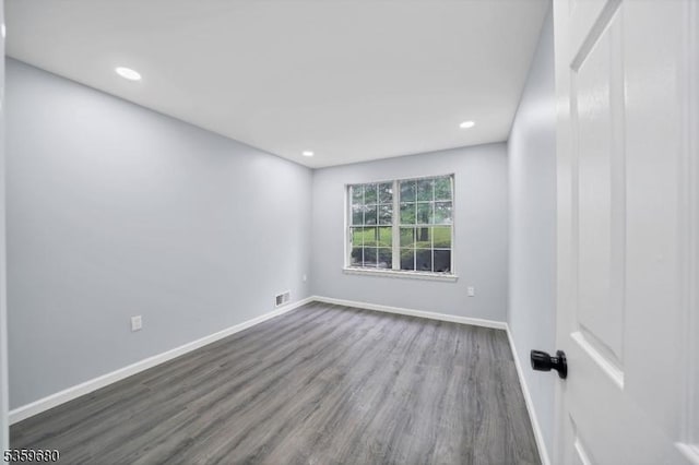 173 Gregory Ln, Franklin Twp, NJ 08823 - unfurnished room featuring dark wood-style flooring, baseboards, and recessed lighting