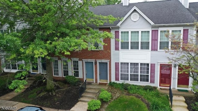 173 Gregory Ln, Franklin Twp, NJ 08823 - multi unit property with a chimney and a shingled roof