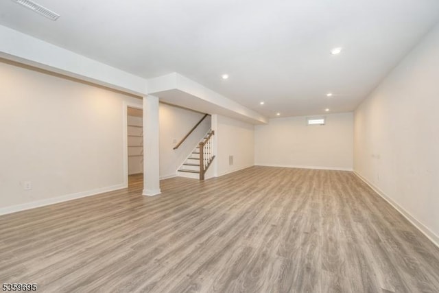 76 Trafalgar Ct, Sparta Twp, NJ 07871 - finished below grade area with light wood finished floors, stairs, recessed lighting, and baseboards