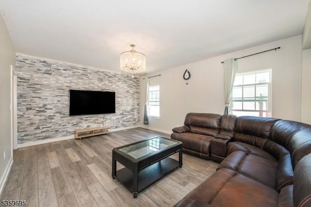 76 Trafalgar Ct, Sparta Twp, NJ 07871 - living room with a chandelier, wood finished floors, and baseboards