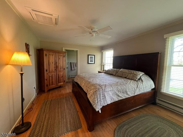 134 Lott Rd, Wantage Twp, NJ 07461 - bedroom featuring light wood-style flooring, ornamental molding, a baseboard heating unit, and ceiling fan