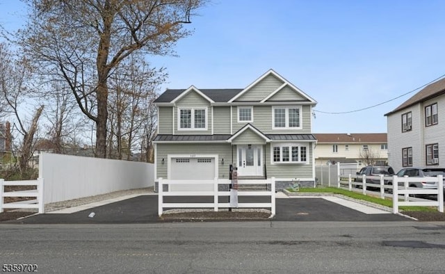 107 Myrtle St, Cranford Twp, NJ 07016 - view of front facade featuring a standing seam roof, metal roof, and asphalt driveway