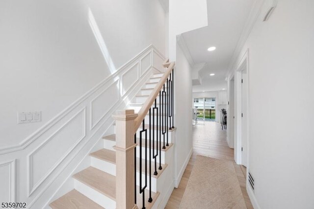 107 Myrtle St, Cranford Twp, NJ 07016 - staircase with recessed lighting, ornamental molding, and wood finished floors