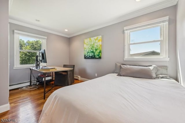 1 Spring Garden Dr, Madison Boro, NJ 07940 - bedroom featuring ornamental molding, wood finished floors, a baseboard radiator, baseboard heating, and baseboards