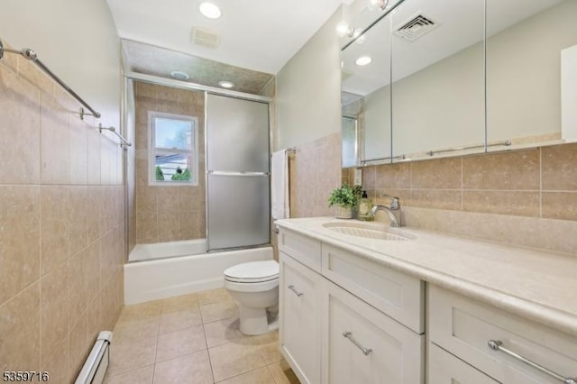 1 Spring Garden Dr, Madison Boro, NJ 07940 - bathroom with tile walls, toilet, vanity, tile patterned floors, and bath / shower combo with glass door