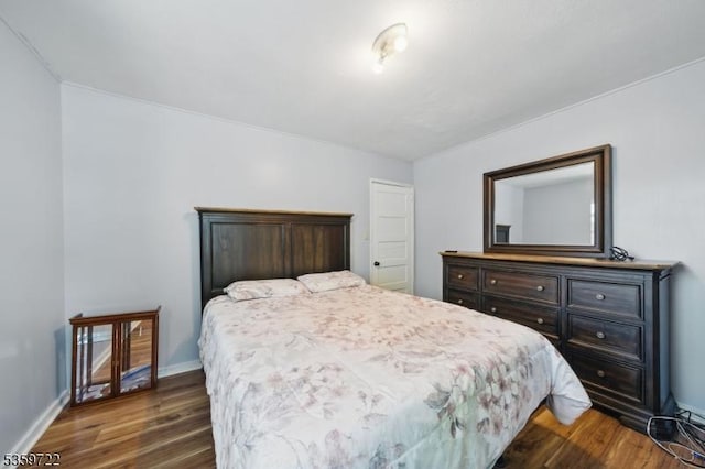 4 Erie Ave, Rockaway Twp, NJ 07866 - bedroom with dark wood-type flooring and baseboards