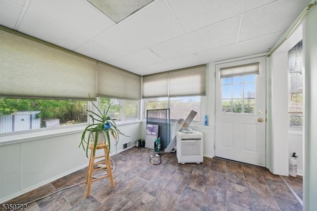 4 Erie Ave, Rockaway Twp, NJ 07866 - sunroom featuring healthy amount of natural light, stone finish floors, and baseboards