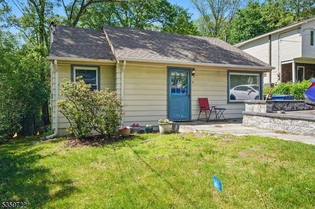 4 Erie Ave, Rockaway Twp, NJ 07866 - view of front of property featuring a front lawn and a shingled roof