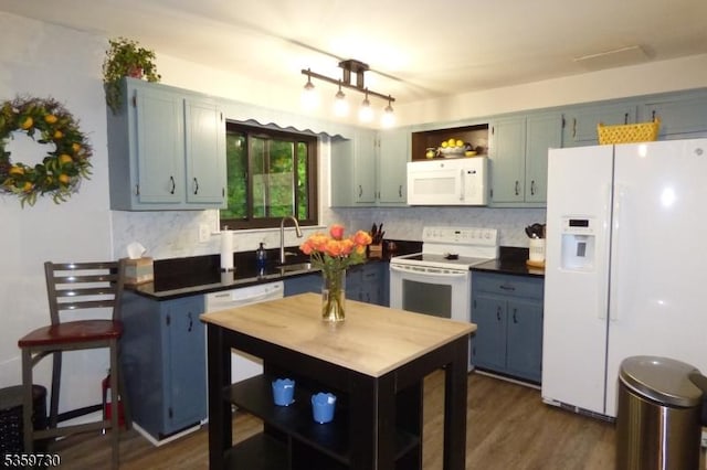 8153 Ashland Ct, Stanhope Boro, NJ 07874 - kitchen with white appliances, open shelves, dark countertops, and decorative backsplash