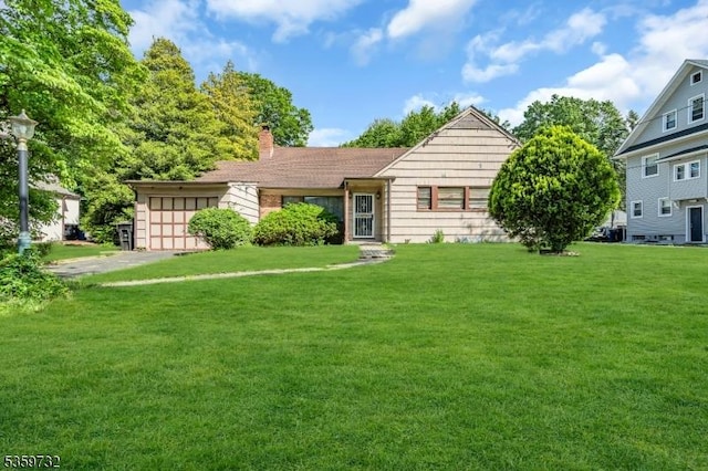 925 Stelle Ave, Plainfield City, NJ 07063 - view of front facade featuring a chimney, a front lawn, and a garage