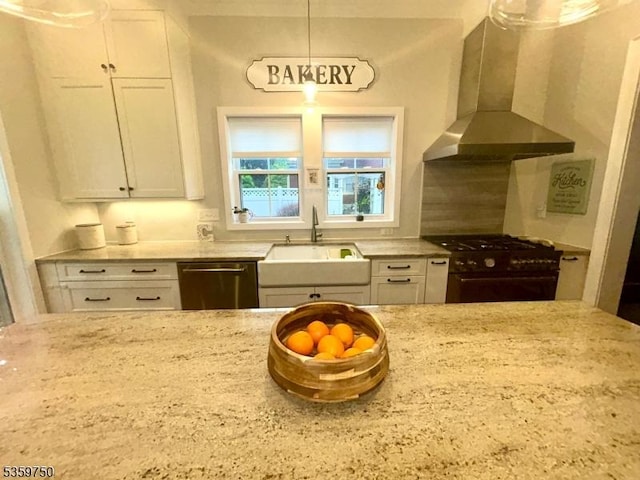 9 Maple St, Lebanon Boro, NJ 08833 - kitchen with gas stove, a sink, stainless steel dishwasher, wall chimney range hood, and light stone countertops