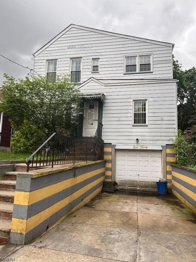 130 Riverview Ave, North Arlington Boro, NJ 07031 - traditional home with driveway and a garage