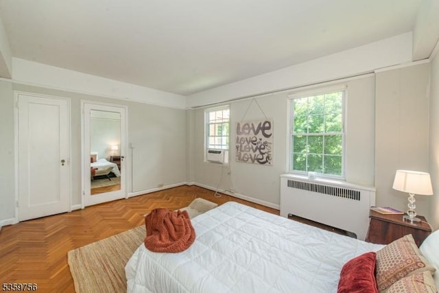 10 Crestmont Rd Unit 3F, Montclair Twp, NJ 07042 - bedroom with radiator heating unit, cooling unit, and baseboards