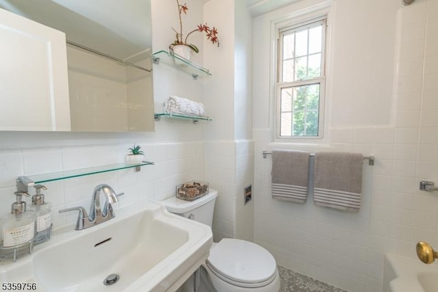 10 Crestmont Rd Unit 3F, Montclair Twp, NJ 07042 - bathroom with a sink, tile walls, toilet, tub / shower combination, and a wainscoted wall