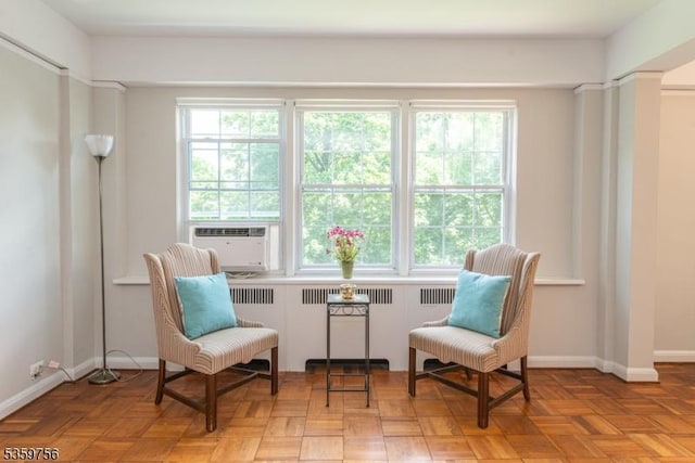 10 Crestmont Rd Unit 3F, Montclair Twp, NJ 07042 - living area with healthy amount of natural light, radiator, cooling unit, and baseboards
