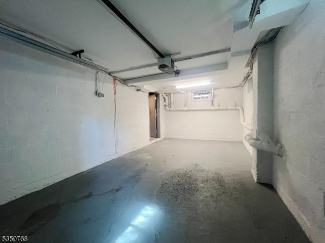 45 Park Ave, Newton Town, NJ 07860 - garage with a garage door opener and concrete block wall
