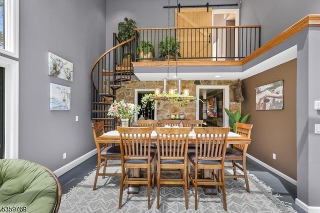 1404 State Route 57, Mansfield Twp, NJ 07865 - dining room featuring baseboards, a high ceiling, and stairs