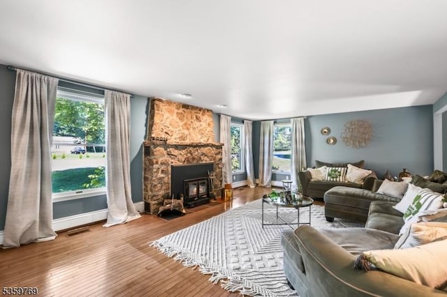 1404 State Route 57, Mansfield Twp, NJ 07865 - living room with plenty of natural light, a fireplace, wood finished floors, and baseboards