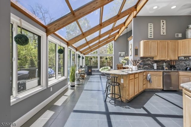 1404 State Route 57, Mansfield Twp, NJ 07865 - sunroom / solarium featuring plenty of natural light, tile patterned floors, beam ceiling, high vaulted ceiling, and baseboards