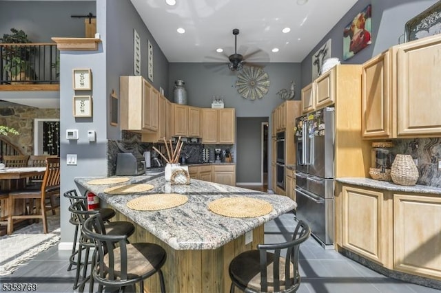 1404 State Route 57, Mansfield Twp, NJ 07865 - kitchen featuring stainless steel appliances, light brown cabinets, ceiling fan, a kitchen bar, and recessed lighting