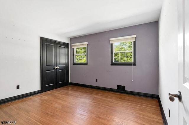 185 Ann St, Dover Town, NJ 07801 - spare room featuring light wood finished floors and baseboards