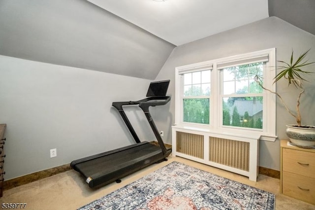 303 March Blvd, Pohatcong Twp, NJ 08865 - exercise room featuring radiator, vaulted ceiling, light carpet, and baseboards