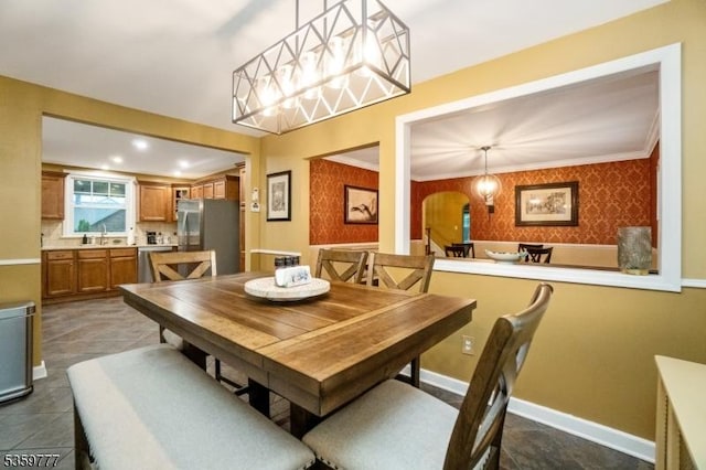 303 March Blvd, Pohatcong Twp, NJ 08865 - dining space featuring arched walkways, ornamental molding, and baseboards