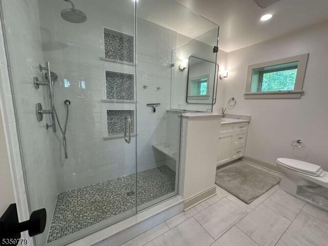 24 Lakeview Point Ave, Frankford Twp, NJ 07826 - full bathroom featuring a stall shower, toilet, vanity, baseboards, and tile patterned flooring