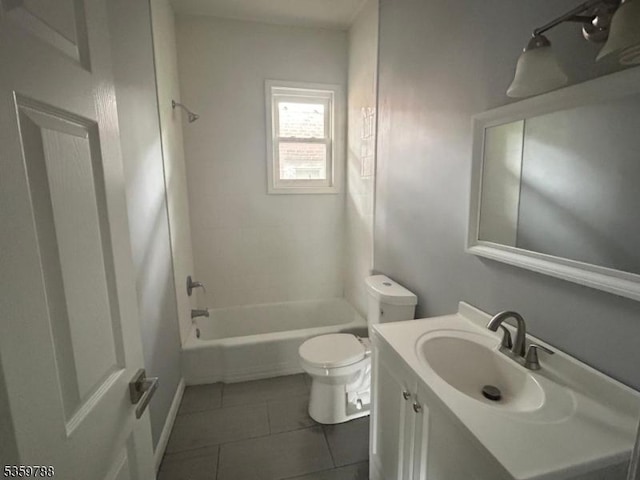 207 Tremont Ave, East Orange City, NJ 07018 - bathroom with toilet, vanity, bathtub / shower combination, and tile patterned flooring