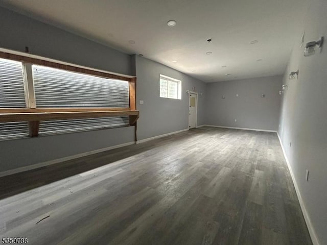 207 Tremont Ave, East Orange City, NJ 07018 - unfurnished living room with wood finished floors, baseboards, and recessed lighting