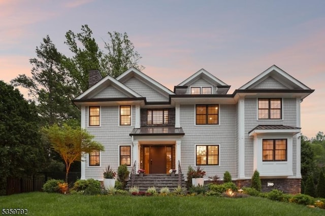 290 Long Hill Dr, Millburn Twp, NJ 07078 - shingle-style home with a chimney, a standing seam roof, a yard, and metal roof