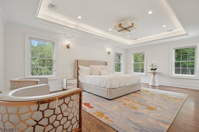 290 Long Hill Dr, Millburn Twp, NJ 07078 - bedroom with a raised ceiling, wood finished floors, ornamental molding, recessed lighting, and baseboards